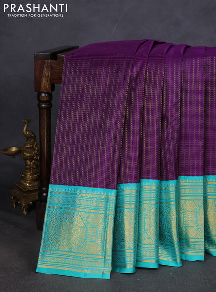 Pure kanchipuram silk saree purple and teal blue with allover zari checks & butta weaves and long zari woven korvai border