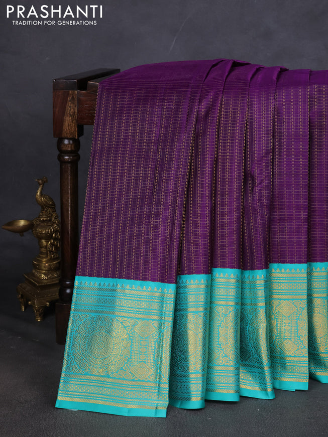 Pure kanchipuram silk saree purple and teal blue with allover zari checks & butta weaves and long zari woven korvai border