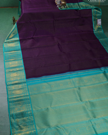 Pure kanchipuram silk saree purple and teal blue with allover zari checks & butta weaves and long zari woven korvai border