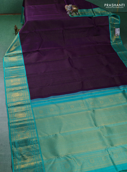 Pure kanchipuram silk saree purple and teal blue with allover zari checks & butta weaves and long zari woven korvai border