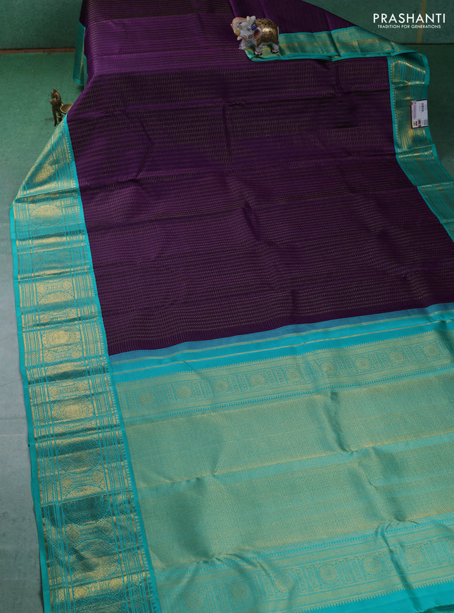 Pure kanchipuram silk saree purple and teal blue with allover zari checks & butta weaves and long zari woven korvai border