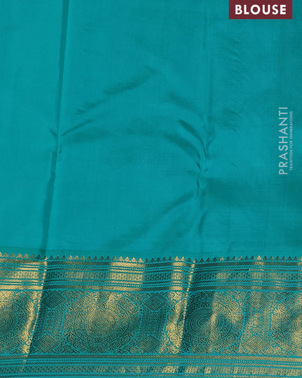 Pure kanchipuram silk saree purple and teal blue with allover zari checks & butta weaves and long zari woven korvai border