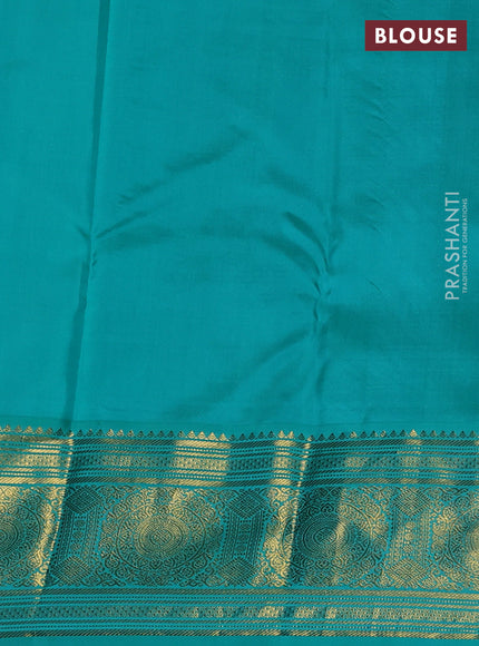 Pure kanchipuram silk saree purple and teal blue with allover zari checks & butta weaves and long zari woven korvai border