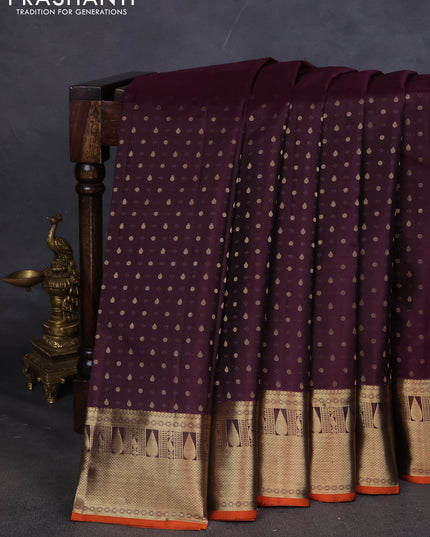 Pure kanchipuram silk saree wine shade and orange with allover zari butta weaves and zari woven border