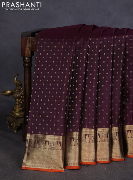 Pure kanchipuram silk saree wine shade and orange with allover zari butta weaves and zari woven border