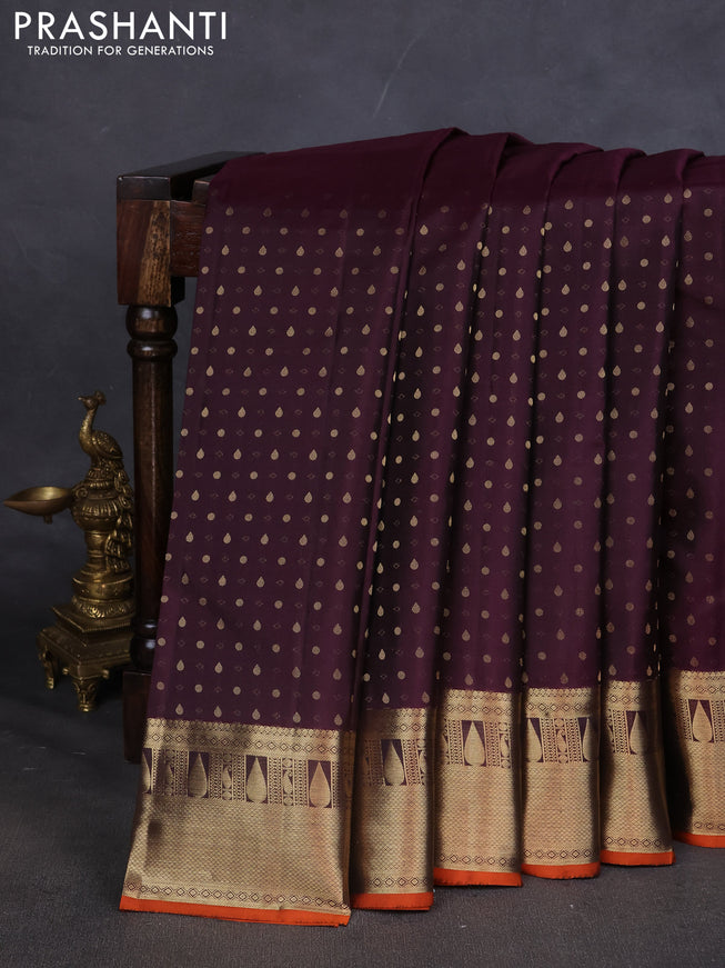 Pure kanchipuram silk saree wine shade and orange with allover zari butta weaves and zari woven border