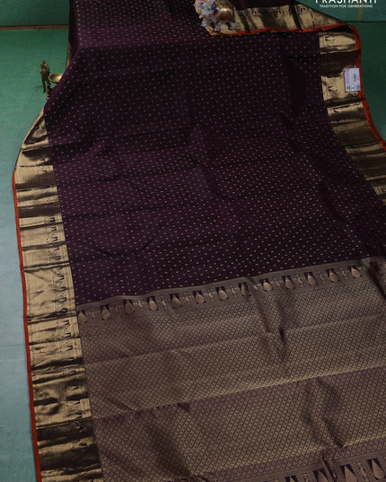 Pure kanchipuram silk saree wine shade and orange with allover zari butta weaves and zari woven border