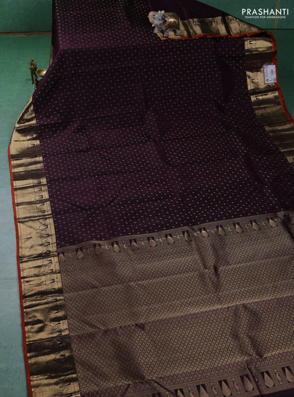 Pure kanchipuram silk saree wine shade and orange with allover zari butta weaves and zari woven border