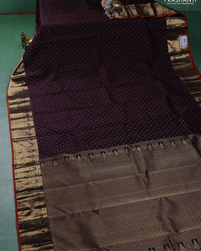 Pure kanchipuram silk saree wine shade and orange with allover zari butta weaves and zari woven border