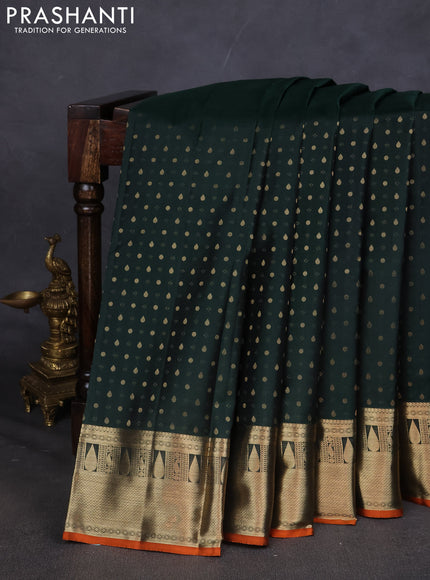 Pure kanchipuram silk saree bottle green and orange with allover zari butta weaves and zari woven border