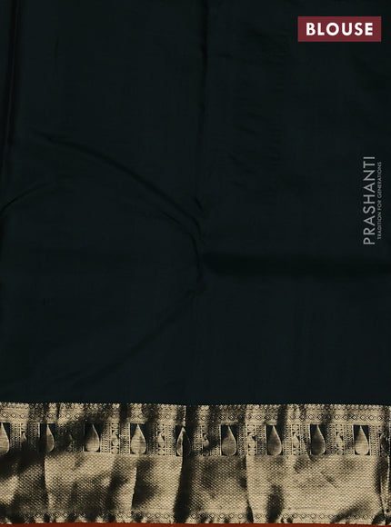 Pure kanchipuram silk saree bottle green and orange with allover zari butta weaves and zari woven border