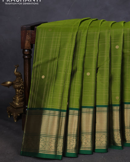 Pure kanchipuram silk saree mehendi green and green with allover zari checked pattern and zari woven border
