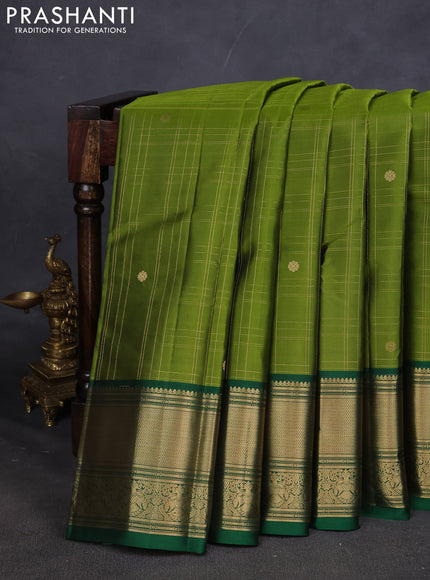 Pure kanchipuram silk saree mehendi green and green with allover zari checked pattern and zari woven border