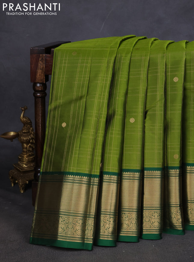 Pure kanchipuram silk saree mehendi green and green with allover zari checked pattern and zari woven border