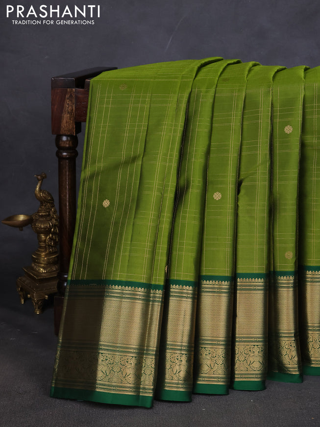 Pure kanchipuram silk saree mehendi green and green with allover zari checked pattern and zari woven border