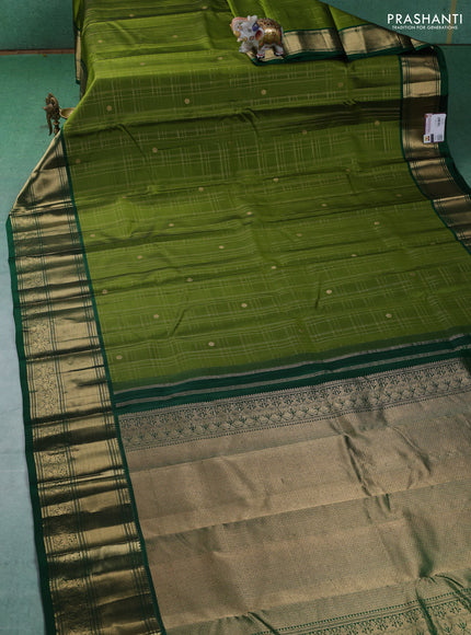 Pure kanchipuram silk saree mehendi green and green with allover zari checked pattern and zari woven border