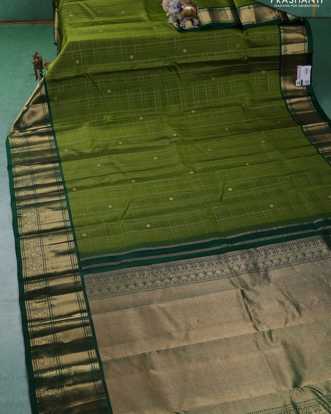 Pure kanchipuram silk saree mehendi green and green with allover zari checked pattern and zari woven border