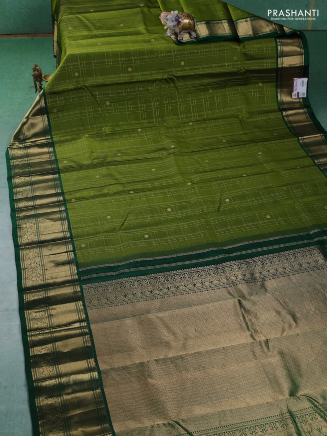 Pure kanchipuram silk saree mehendi green and green with allover zari checked pattern and zari woven border