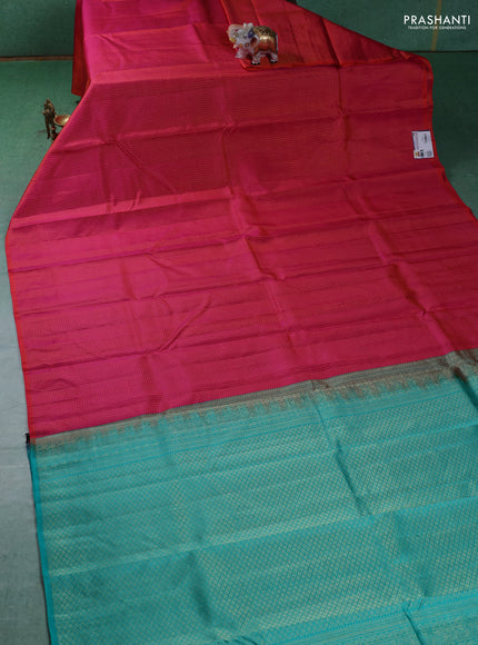 Pure kanchipuram silk saree dual shade of pink and teal blue with allover zari checked pattern in borderless style