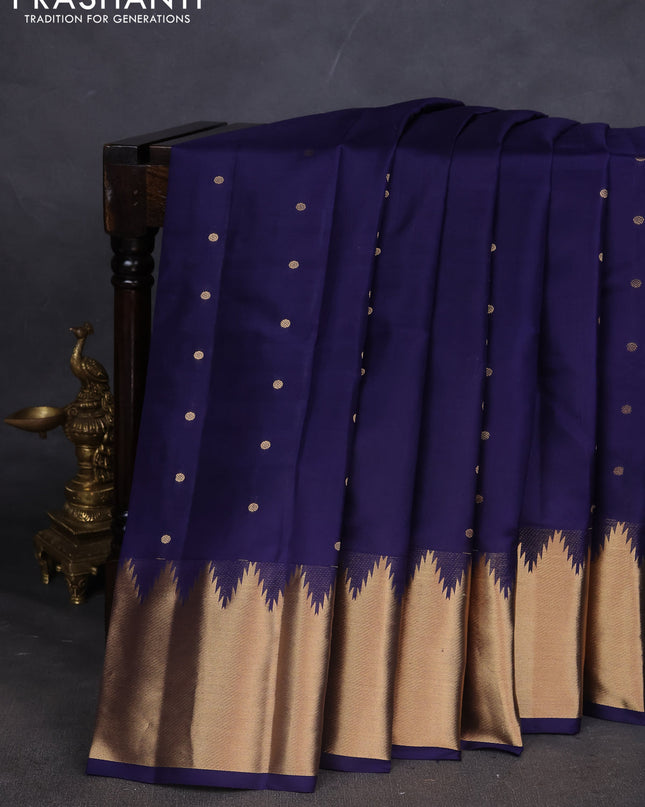 Pure kanchipuram silk saree dark blue with zari woven buttas and temple design zari woven border