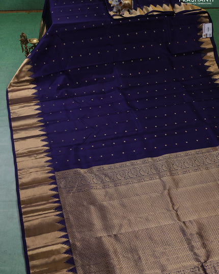 Pure kanchipuram silk saree dark blue with zari woven buttas and temple design zari woven border