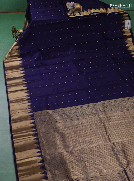 Pure kanchipuram silk saree dark blue with zari woven buttas and temple design zari woven border