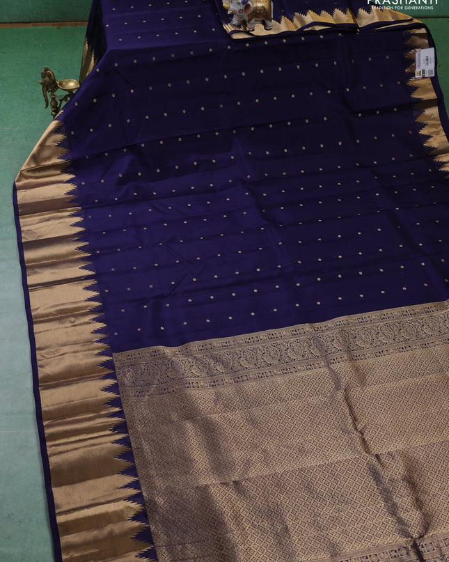 Pure kanchipuram silk saree dark blue with zari woven buttas and temple design zari woven border
