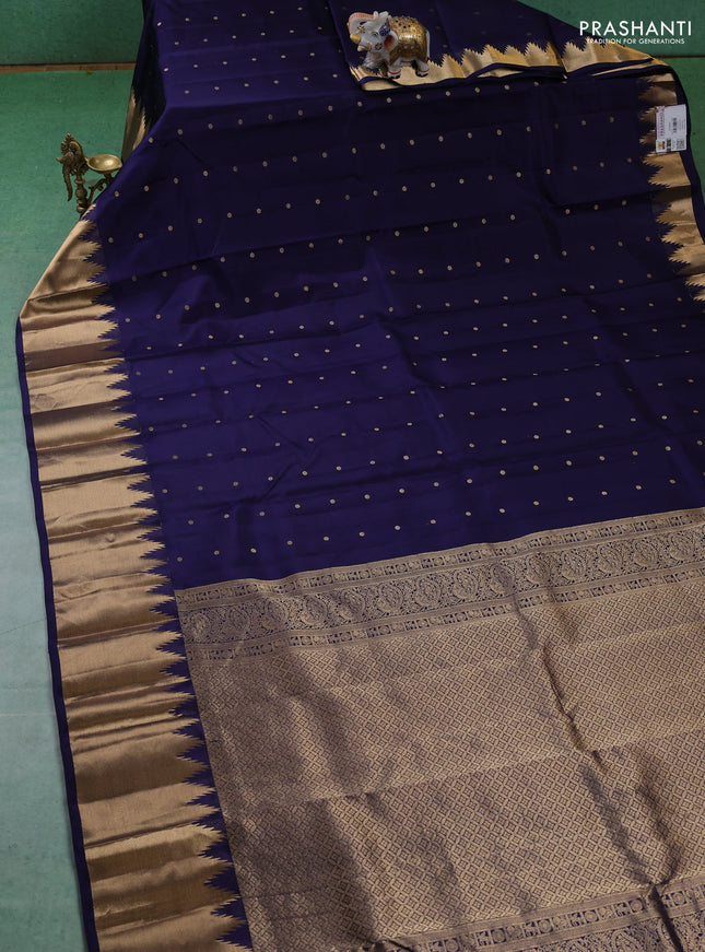 Pure kanchipuram silk saree dark blue with zari woven buttas and temple design zari woven border