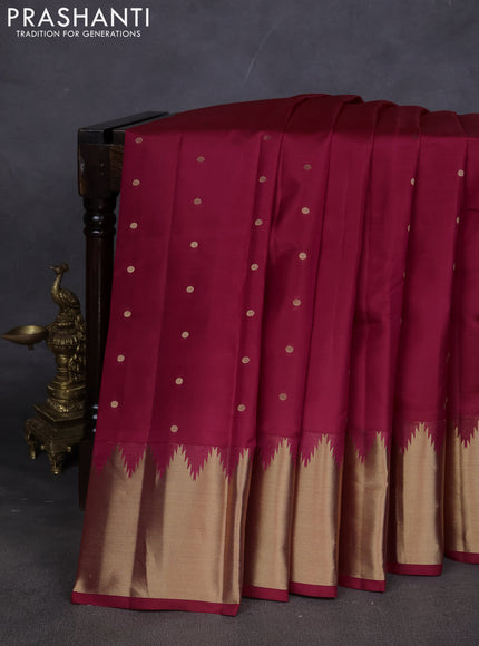 Pure kanchipuram silk saree dark pink with zari woven buttas and temple design zari woven border