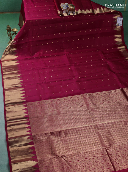 Pure kanchipuram silk saree dark pink with zari woven buttas and temple design zari woven border