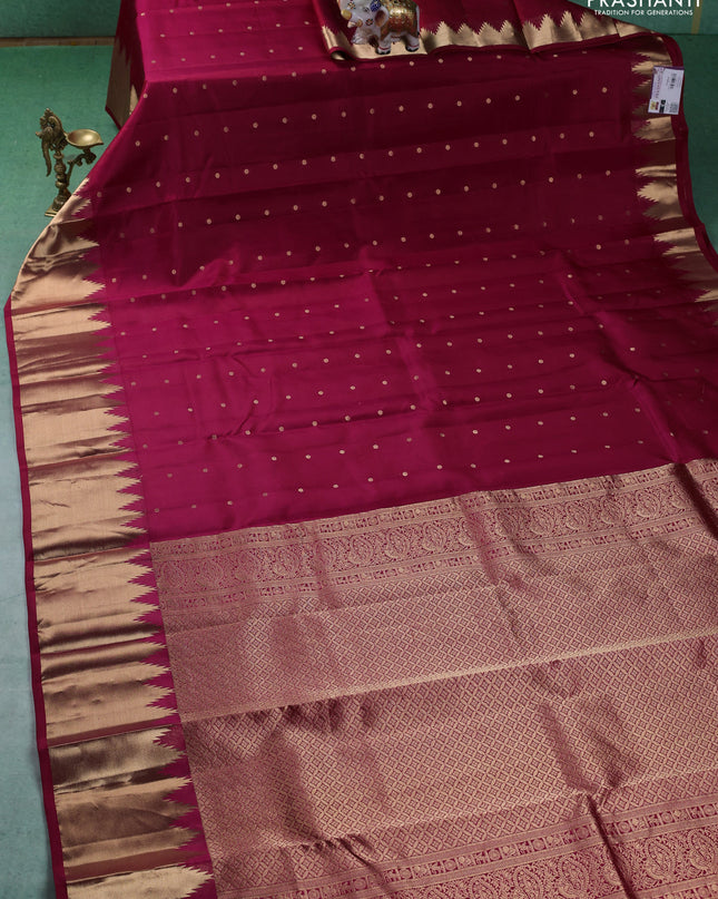 Pure kanchipuram silk saree dark pink with zari woven buttas and temple design zari woven border