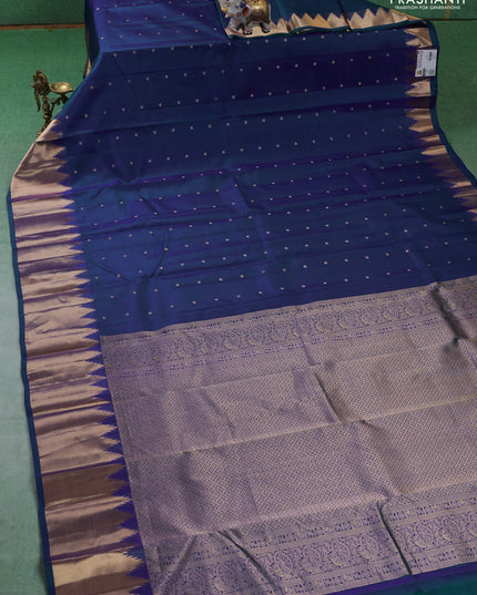 Pure kanchipuram silk saree blue with zari woven buttas and temple design zari woven border