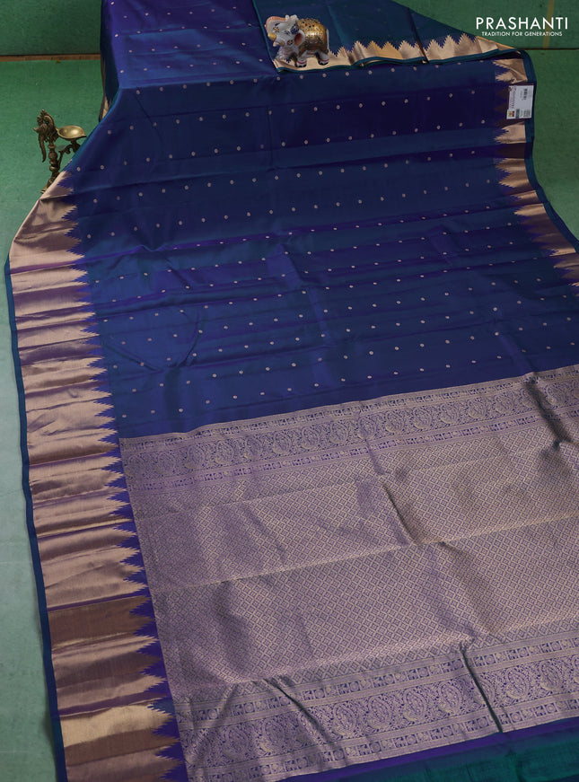 Pure kanchipuram silk saree blue with zari woven buttas and temple design zari woven border
