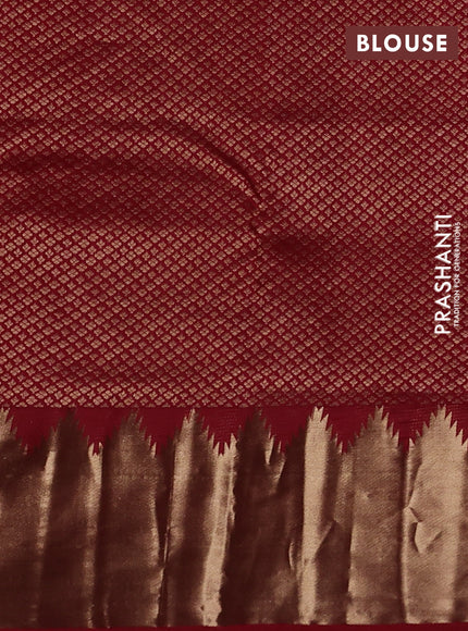 Pure kanchipuram silk saree maroon with plain body and temple design zari woven border