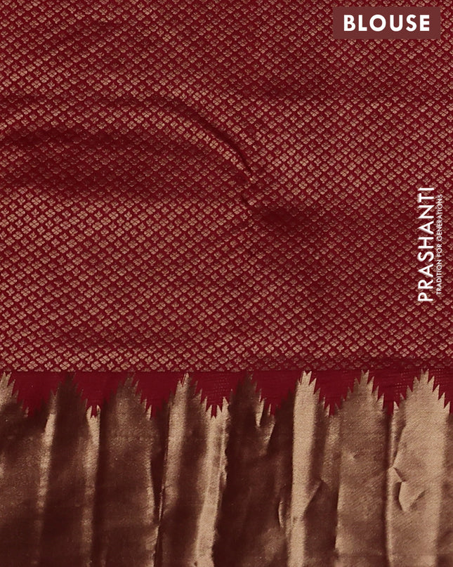 Pure kanchipuram silk saree maroon with plain body and temple design zari woven border