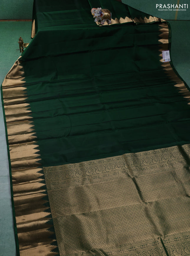 Pure kanchipuram silk saree green with plain body and temple design zari woven border