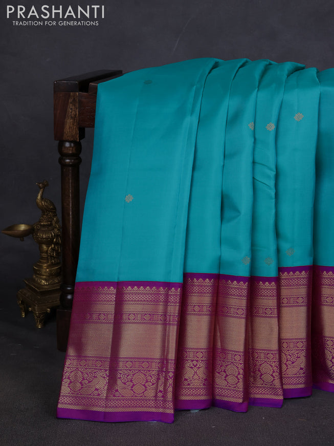 Pure kanchipuram silk saree teal blue and purple with zari woven buttas and long zari woven korvai border