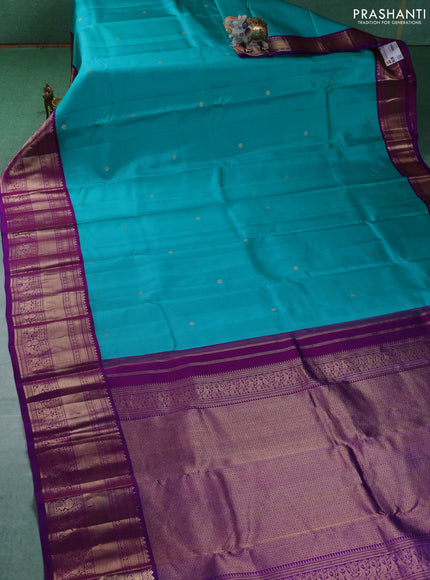 Pure kanchipuram silk saree teal blue and purple with zari woven buttas and long zari woven korvai border