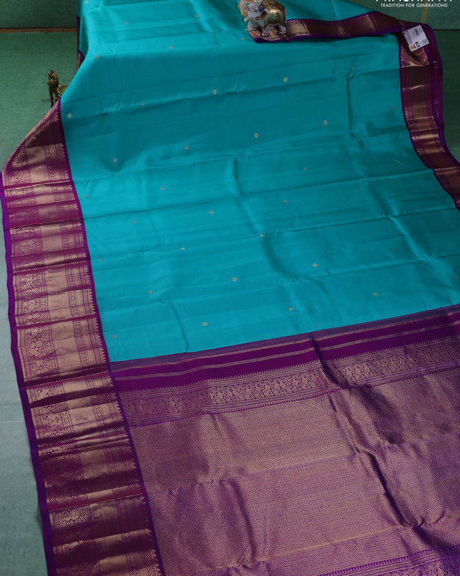 Pure kanchipuram silk saree teal blue and purple with zari woven buttas and long zari woven korvai border