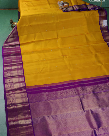 Pure kanchipuram silk saree coffee brown and teal blue with allover zari checked pattern in borderless style