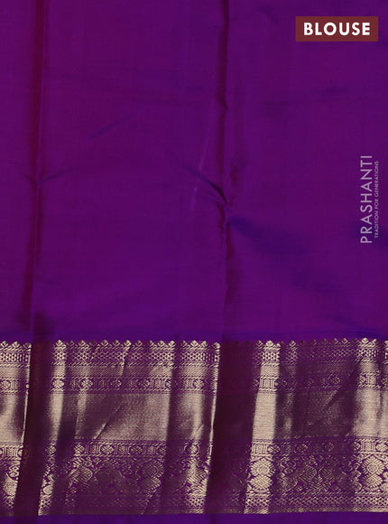 Pure kanchipuram silk saree yellow and purple with zari woven buttas and long zari woven korvai border