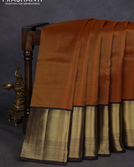 Pure kanchipuram silk saree orange and coffee brown with allover zari checked pattern and long zari woven korvai border