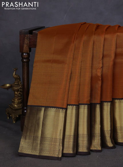 Pure kanchipuram silk saree orange and coffee brown with allover zari checked pattern and long zari woven korvai border
