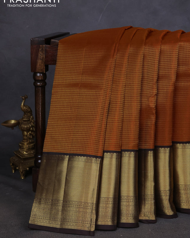 Pure kanchipuram silk saree orange and coffee brown with allover zari checked pattern and long zari woven korvai border