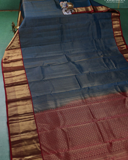 Pure kanchipuram silk saree peacock blue and maroon with allover zari checked pattern and long zari woven korvai border