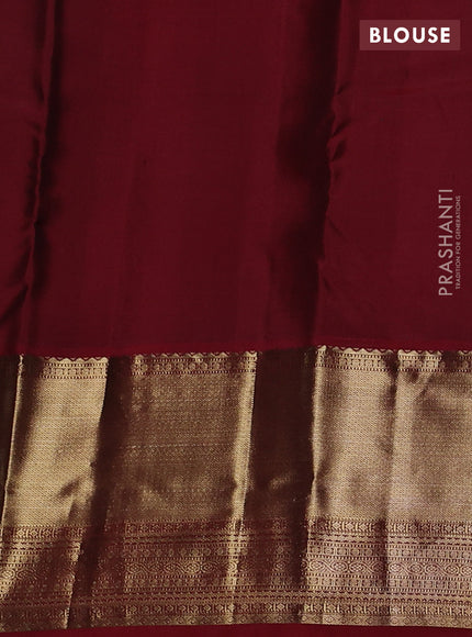 Pure kanchipuram silk saree peacock blue and maroon with allover zari checked pattern and long zari woven korvai border