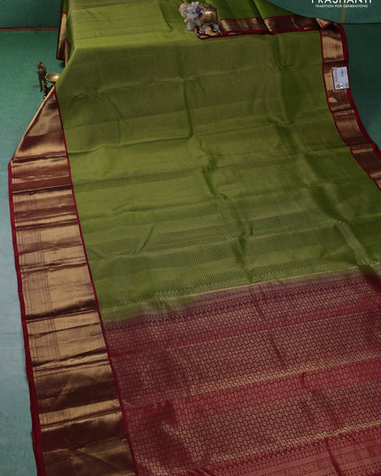 Pure kanchipuram silk saree mehendi green and maroon with allover zari checked pattern and long zari woven korvai border