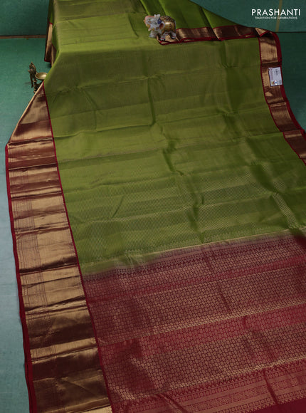 Pure kanchipuram silk saree mehendi green and maroon with allover zari checked pattern and long zari woven korvai border