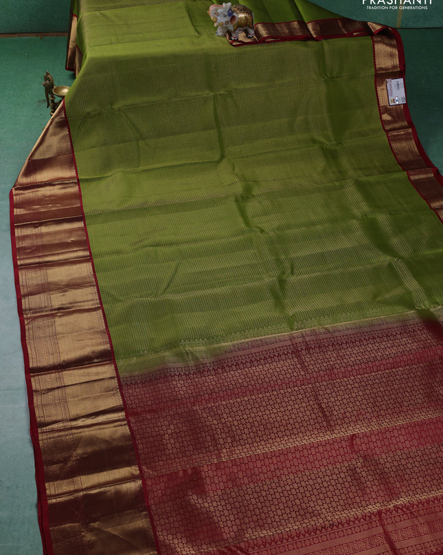 Pure kanchipuram silk saree mehendi green and maroon with allover zari checked pattern and long zari woven korvai border