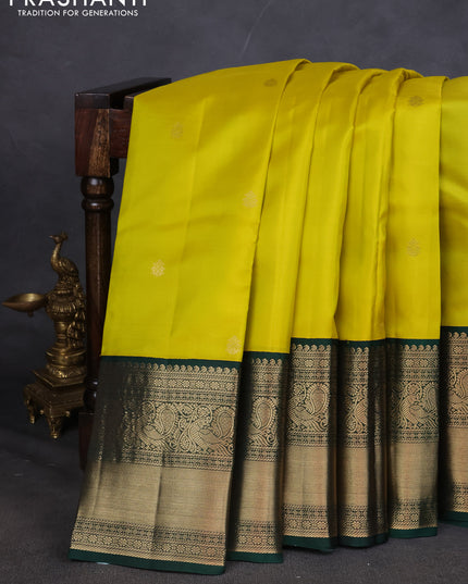 Pure kanchipuram silk saree lime yellow and dark green with zari woven buttas and long zari woven korvai border